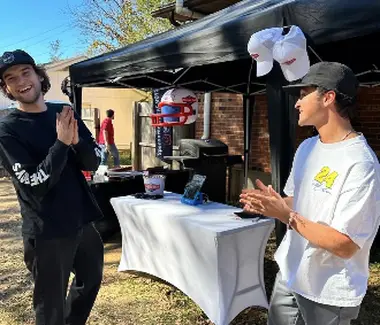 Friends at a backyard tailgate